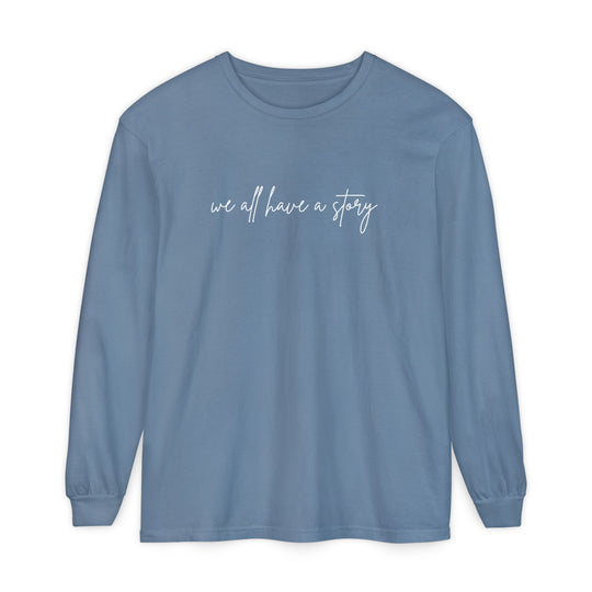 We all have a Story Long Sleeve Tee, featuring a relaxed fit with garment-dyed 100% cotton fabric, ideal for casual, comfortable wear.