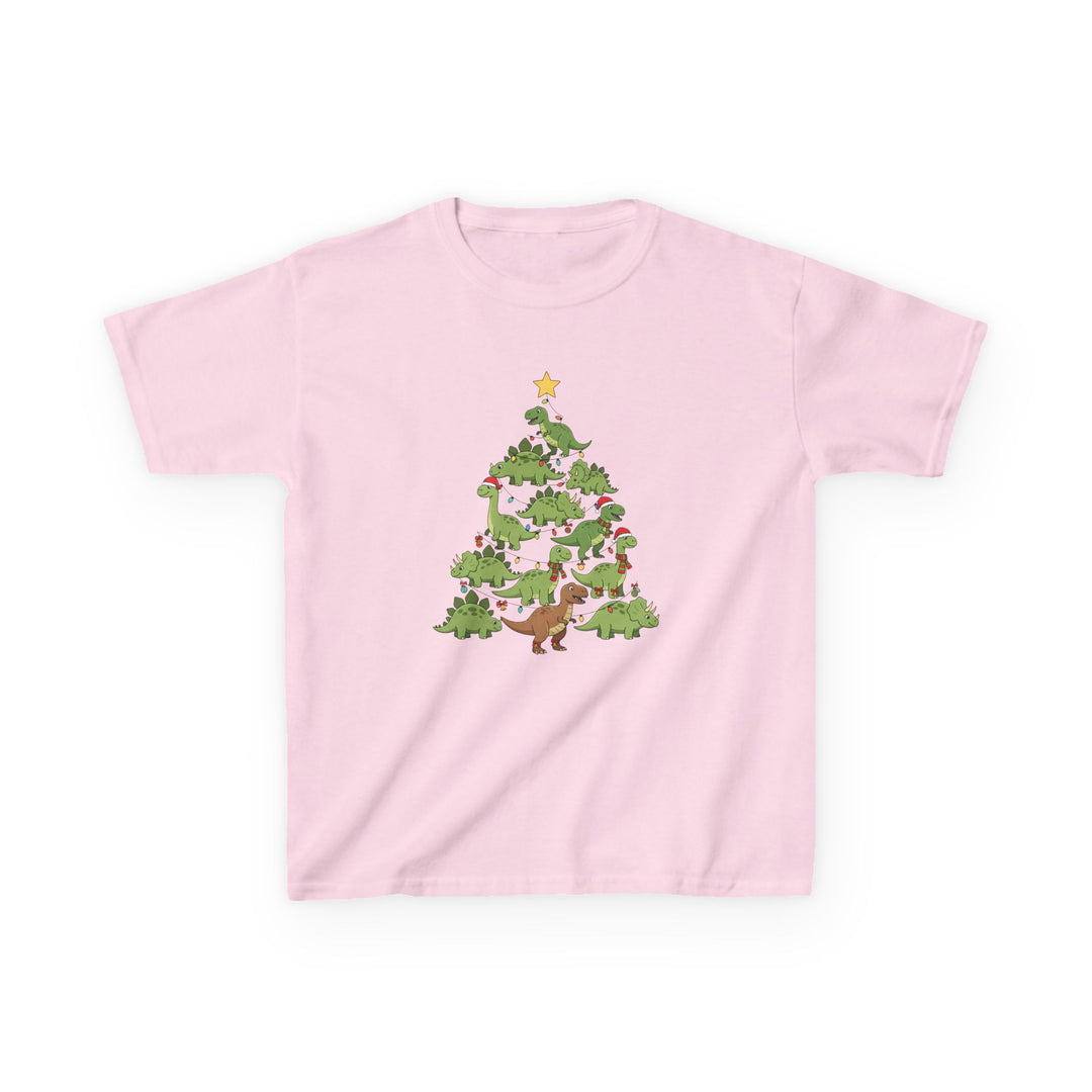 Dino Tree Kids Tee features cartoon dinosaurs stacked as a festive tree, adorned with lights and holiday accessories, on a light-pink cotton T-shirt.