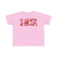Light-pink toddler tee with “LOVE” in textured chenille letters, offering softness for sensitive skin. Ideal for first adventures.