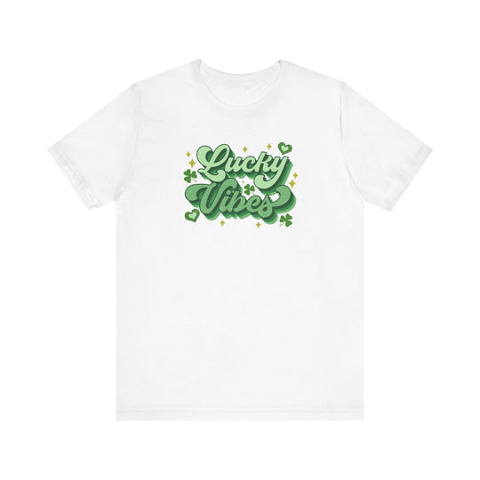Good Day Lucky Day Tee: A white t-shirt with green text featuring shamrocks and stars, crafted from soft cotton with ribbed knit collars and durable side seams.
