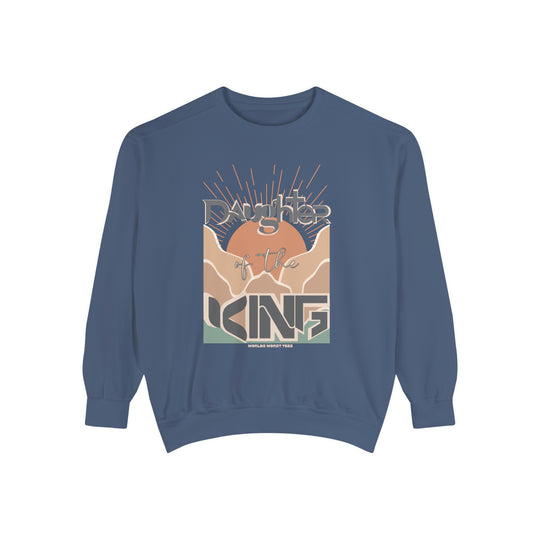 Daughter of the King Crew unisex sweatshirt in blue with graphic design. Luxurious 80% ring-spun cotton, 20% polyester fabric, relaxed fit, rolled-forward shoulder, and back neck patch. From Worlds Worst Tees.