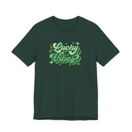 Dark-green Good Day Lucky Day Tee featuring Lucky Vibes in stylized green lettering with clover motifs and sparkles, highlighting a classic, soft cotton design.