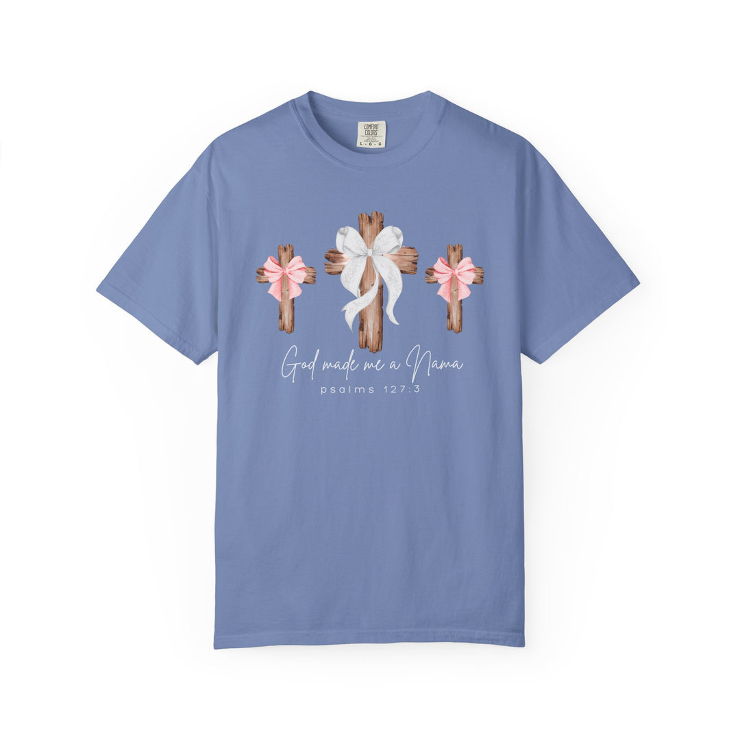 Light periwinkle T-shirt with three rustic wooden crosses and God made me a Nana text. Features a relaxed fit, 100% cotton build, and durable stitching.
