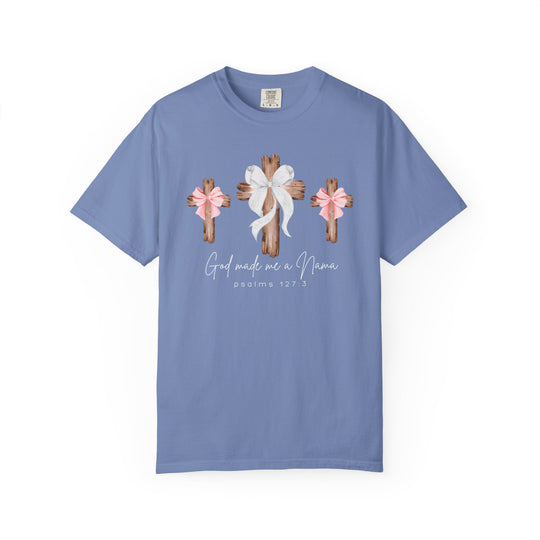 Light periwinkle T-shirt with three rustic wooden crosses and God made me a Nana text. Features a relaxed fit, 100% cotton build, and durable stitching.