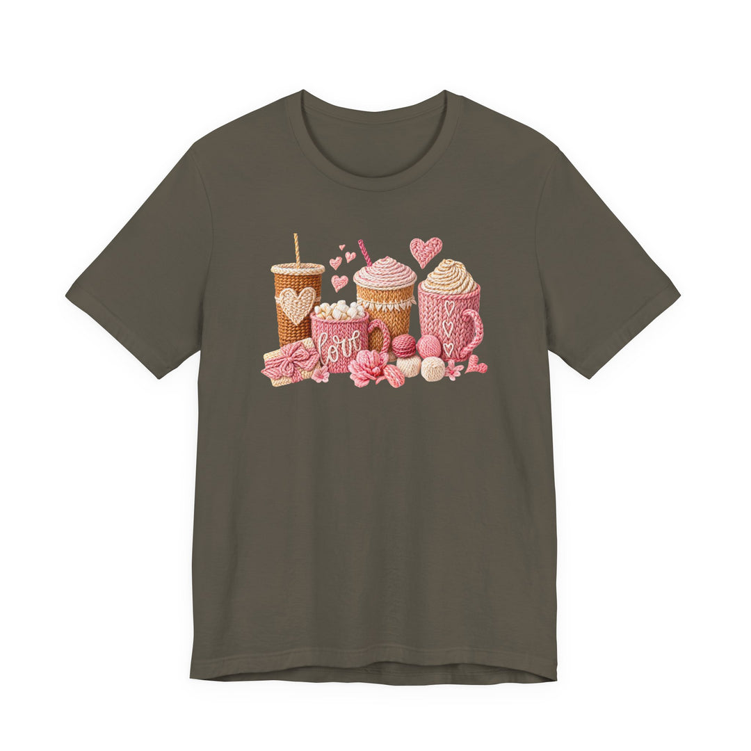 Coffee Love Tee featuring knitted-style graphic of drink vessels, yarn, and love-themed items in cozy tones on a dark-olive crew-neck T-shirt.