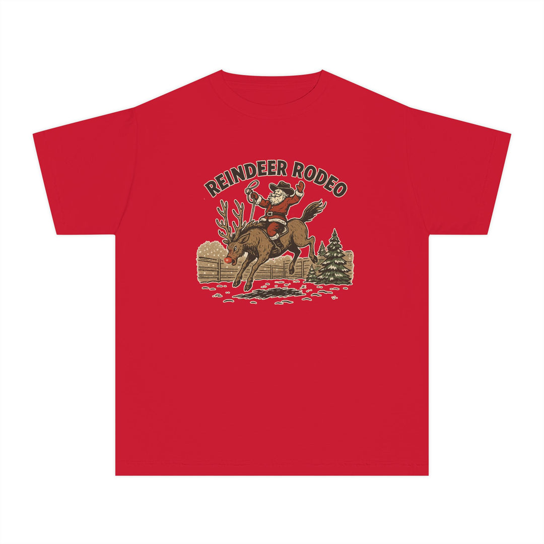 Reindeer Rodeo Kids Tee with vintage Christmas graphic of Santa riding a reindeer; perfect for active kids' comfort with soft, 100% combed cotton.