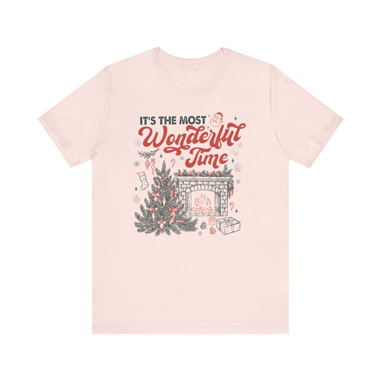 Most Wonderful Time of the Year Tee featuring a festive scene with a Christmas tree and fireplace, perfect for adding holiday cheer to your wardrobe.