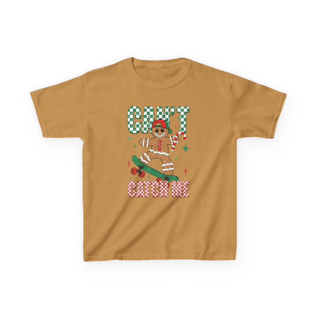 Can't Catch Me Kids Tee features a gingerbread cookie on a skateboard with holiday-themed lettering, offering a festive, durable, and comfortable design for everyday wear.