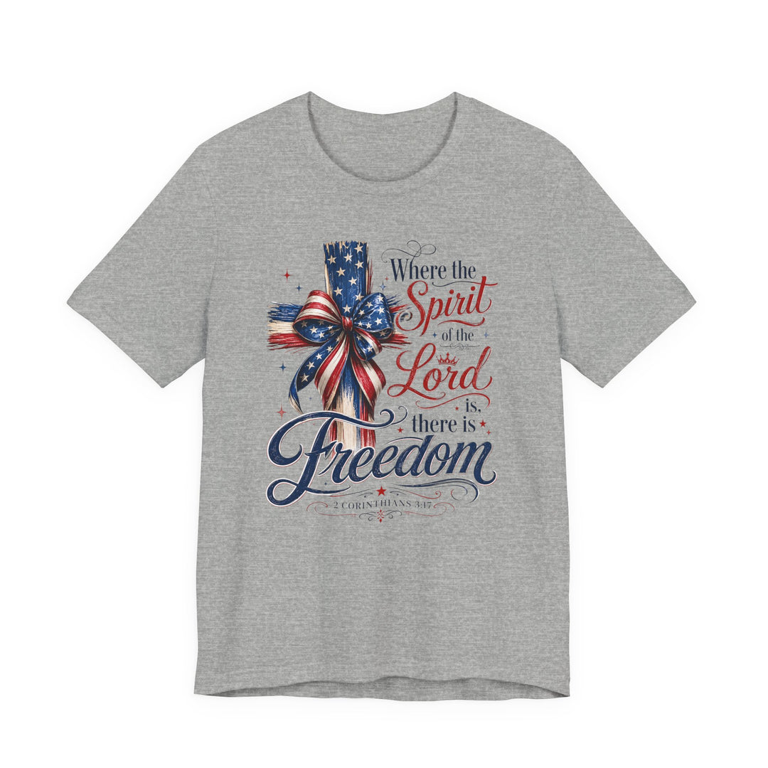 Heather-gray Spirit of the Lord Tee featuring a red, white, and blue wooden cross graphic with a ribbon, and biblical verse in decorative lettering.