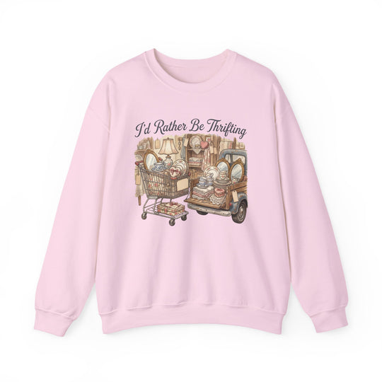 “I'd Rather Be Thrifting Crew” sweatshirt with thrift-themed graphic of a cart and truck filled with assorted vintage items. Comfortable, unisex fit.