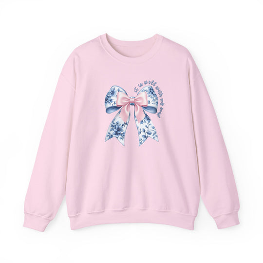 Light-pink All is Well With My Soul crewneck sweatshirt featuring a decorative bow with a blue floral pattern and comforting script text.
