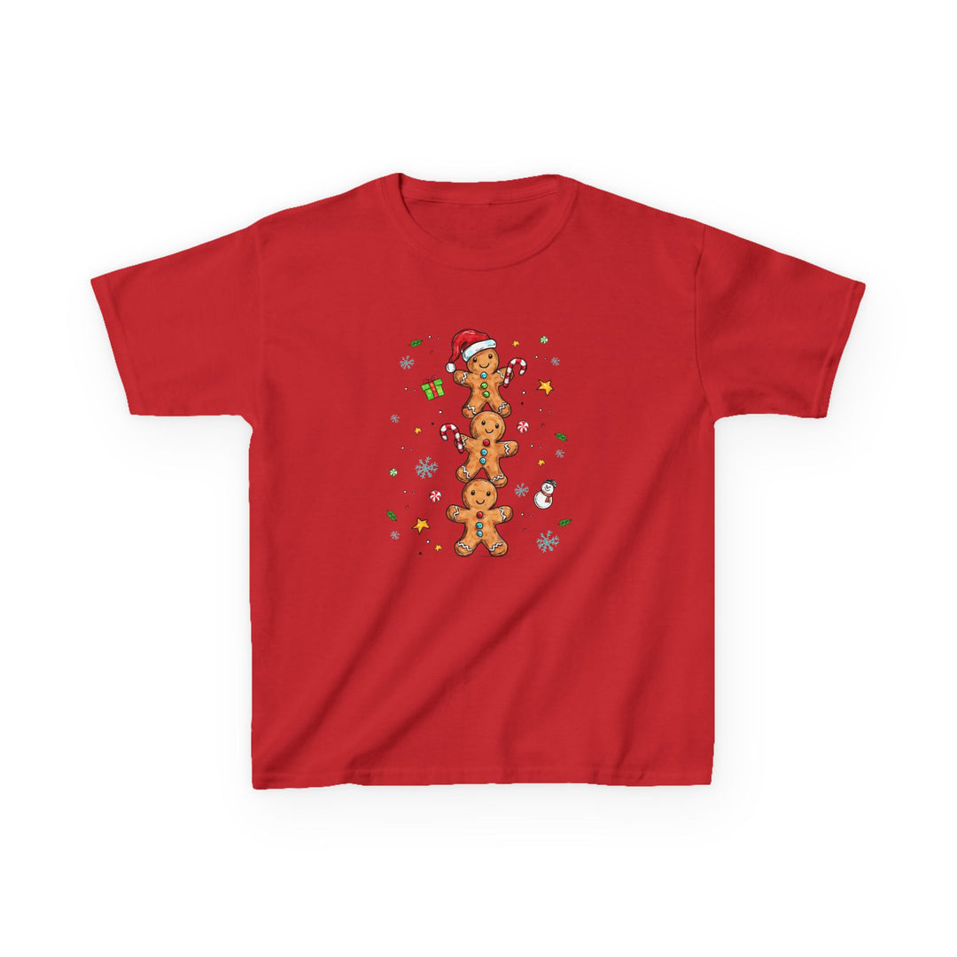 Gingerbread Stack Kids Tee featuring three gingerbread figures with Christmas motifs like snowflakes and candy. Made from soft, durable cotton, perfect for everyday wear.
