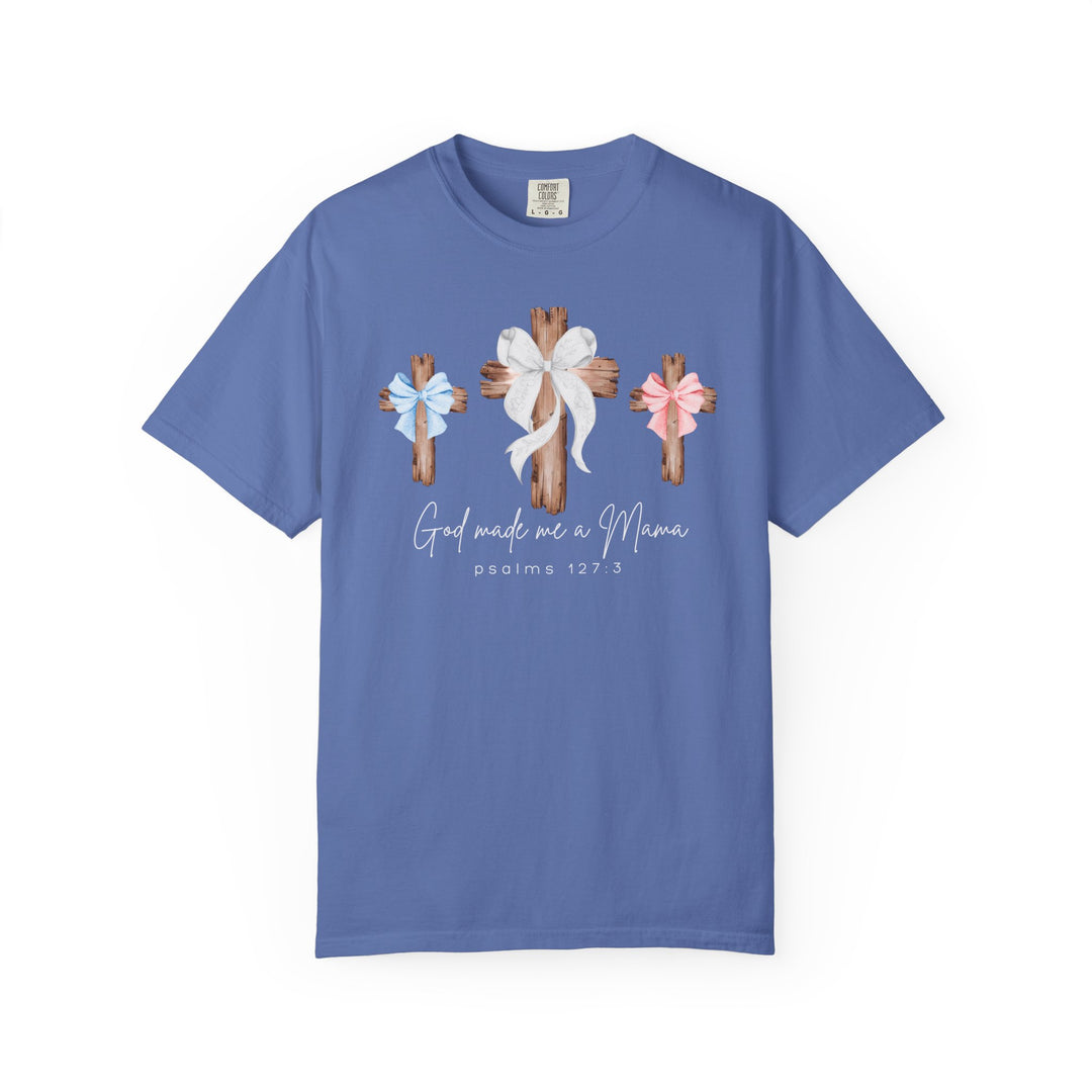 Blue God Made Me a Mama Comfort Colors T-shirt featuring rustic wooden crosses and a Bible verse, crafted from soft 100% ring-spun cotton for a relaxed fit.