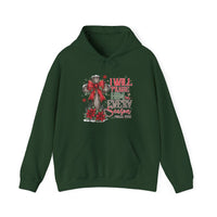 Praise Him in Every Season Hoodie featuring a rustic wooden cross with a red bow, poinsettias, snowflakes, and pine sprigs, perfect for cold days.