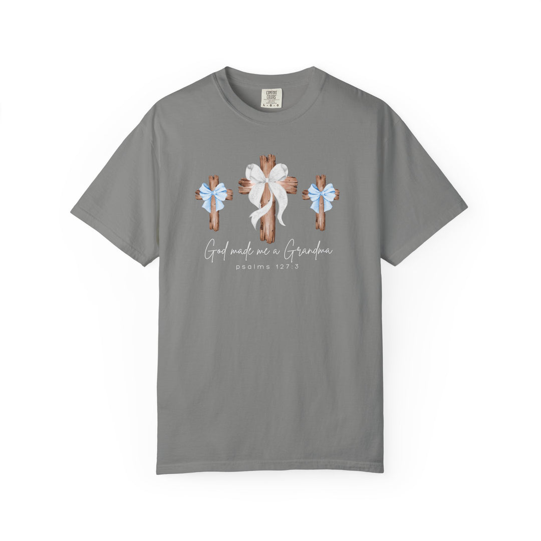 Heather-gray tee featuring three rustic wooden crosses with bows and God made me a Grandma text, offering comfort and style from Faith Family Designs.