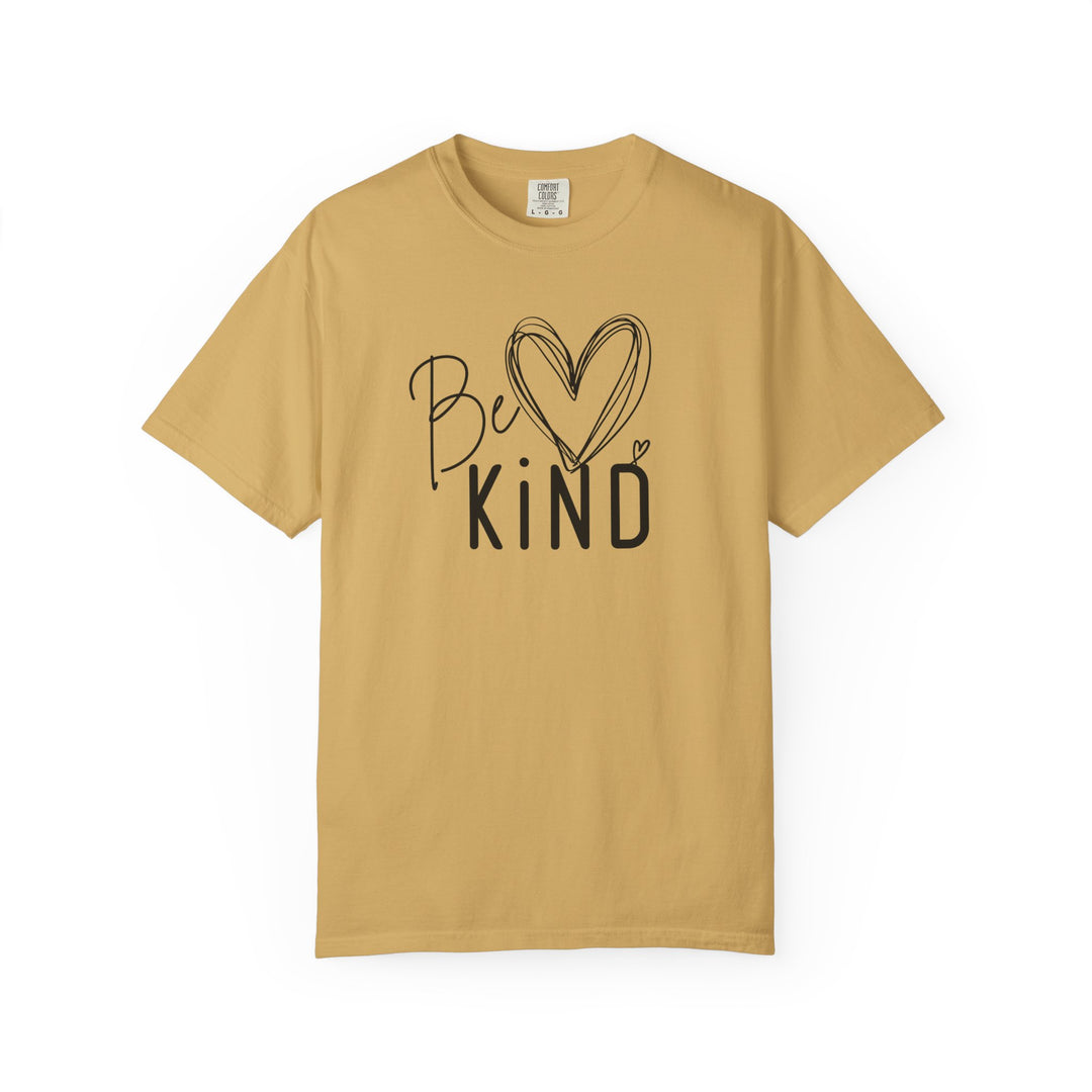 Be Kind Tee in mustard yellow with hand-lettered inspirational slogan and heart design, embodying Faith Family Designs' unique graphic t-shirts ethos.