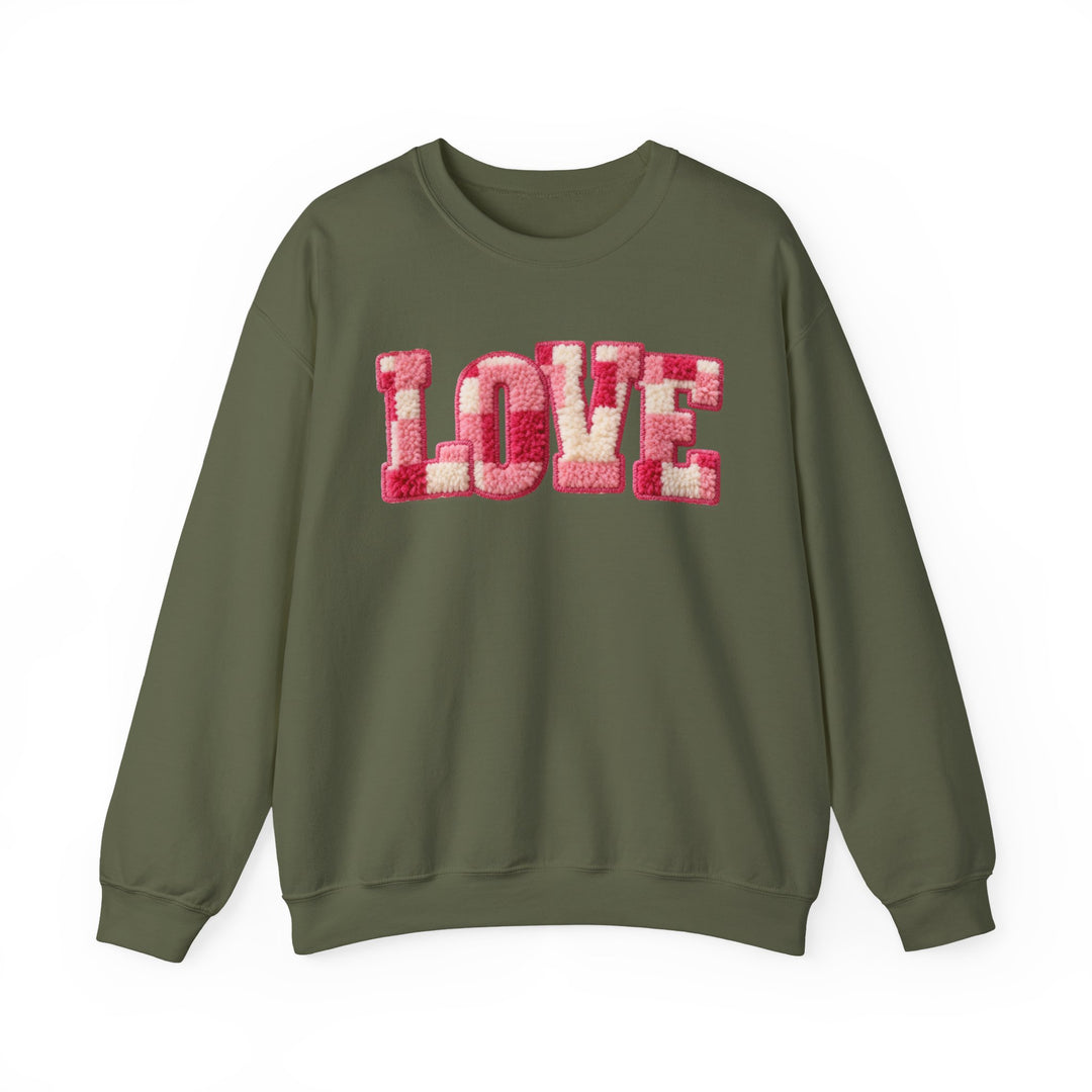 Olive-green Love Crew sweatshirt with pink and cream chenille LOVE patch on chest, offering comfort with a ribbed collar and loose fit.