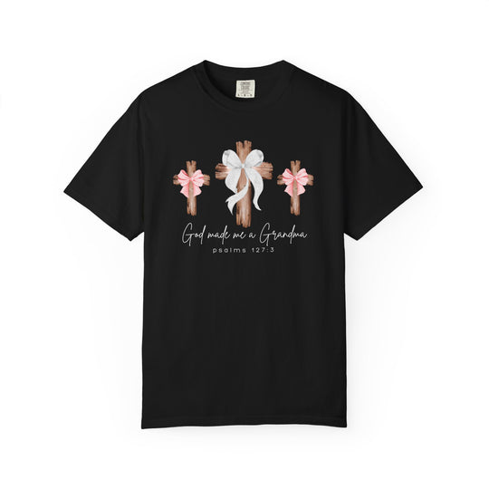 God Made Me a Grandma Tee features rustic wooden crosses and the phrase 'psalms 127:3,' offering comfort and style with a relaxed fit.