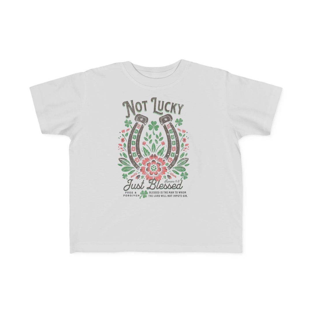 Blessed Toddler's Tee features a graphic design of flowers and horseshoes, crafted from soft cotton, ideal for toddlers' sensitive skin. Perfect for first adventures.