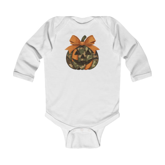 Jackie O Long Sleeve Onesie featuring a camouflage jack-o’-lantern with an orange bow, perfect for infants, combines durability with comfort and ease of changing.