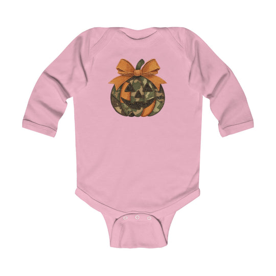 Jackie O Long Sleeve Onesie, featuring a camouflage jack-o-lantern graphic and orange bow, with snap closures for easy changing, designed for durability and comfort.