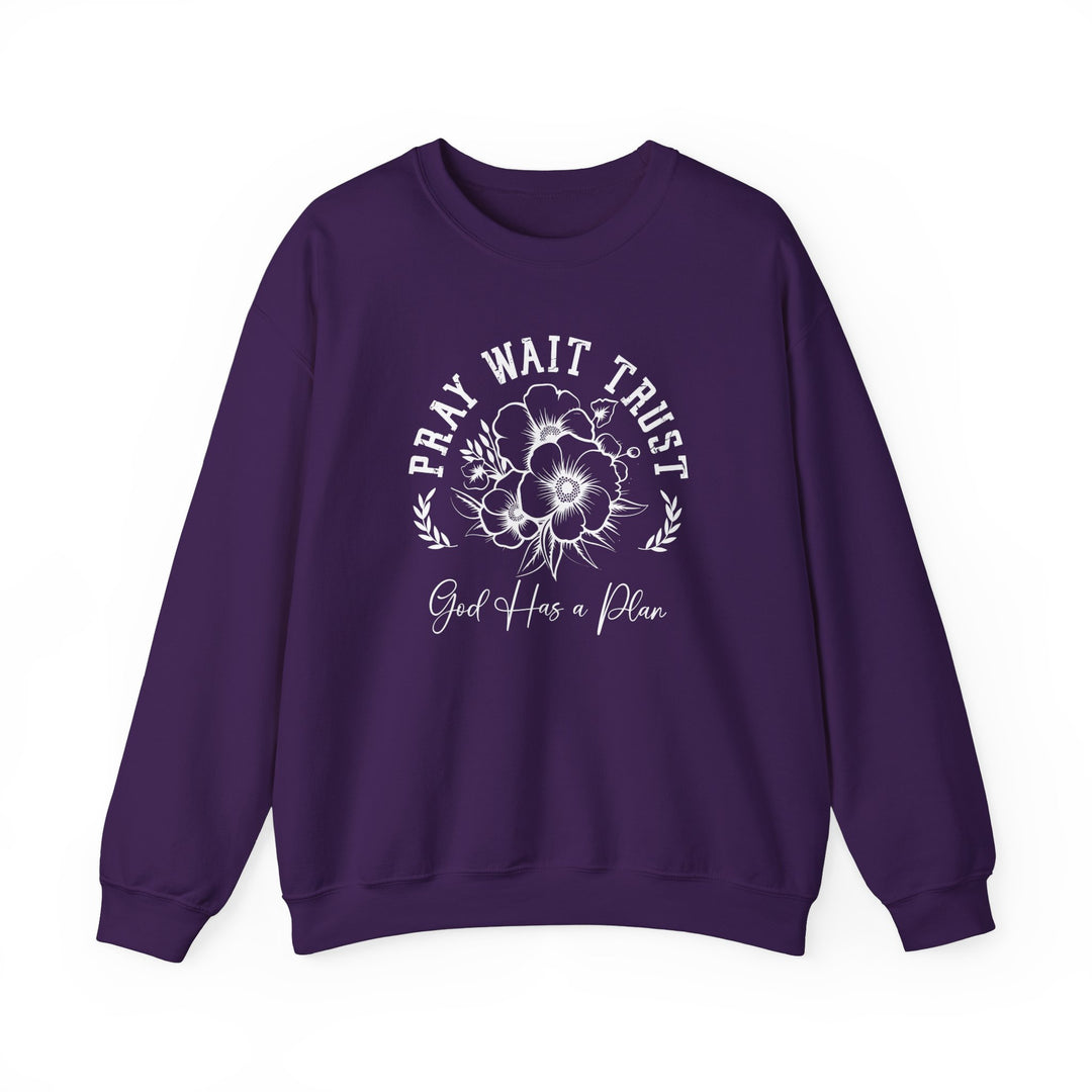 Pray Wait Trust Crew: Purple sweatshirt with white text and floral design, unisex, 50% cotton and 50% polyester blend, ribbed collar, comfortable fit.