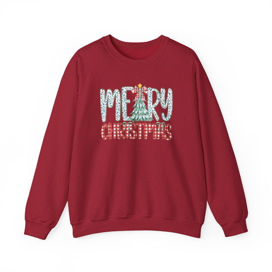 Red crewneck sweatshirt featuring a festive Merry Christmas graphic with holly-leaf and gingham patterns, ideal for cozy, stylish holiday wear.