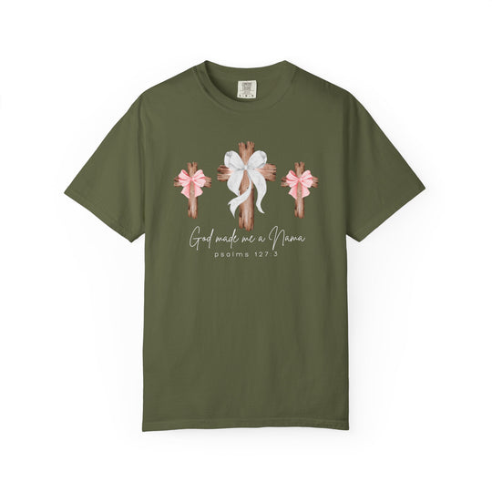 Olive-green T-shirt featuring three rustic wooden crosses with bows and the text 'God made me a Nana' and 'psalms 127:3,' ideal for casual wear.