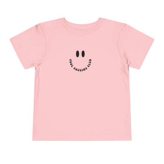 Toddler wearing the Cool Cousins Club Toddler Tee, a comfortable Bella Canvas short sleeve made of 100% cotton, perfect for everyday wear.