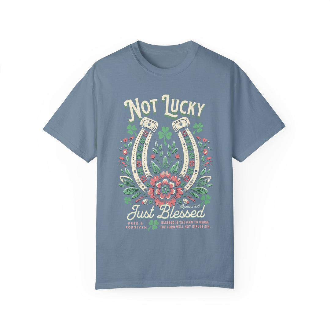 Blessed Tee: Blue t-shirt featuring a graphic of a horseshoe surrounded by flowers, made from soft, durable, 100% ring-spun cotton.
