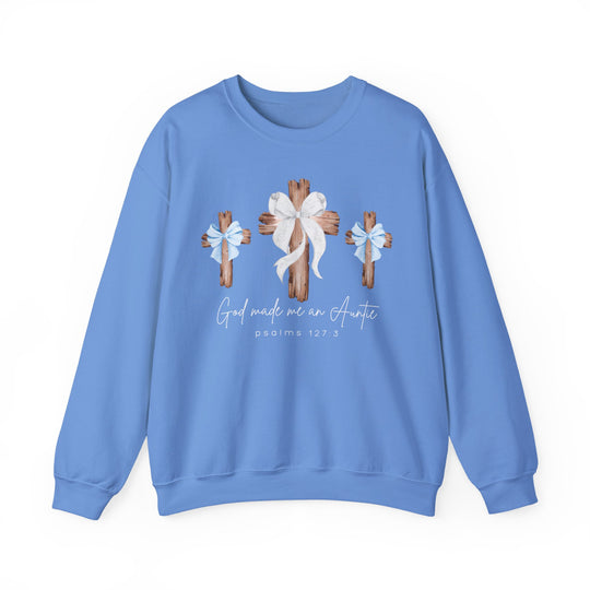 Baby-blue crewneck sweatshirt with God Made Me a Girl - Boy Auntie design featuring three wooden crosses and Psalms 127:3 text. Comfortable, unisex fit.