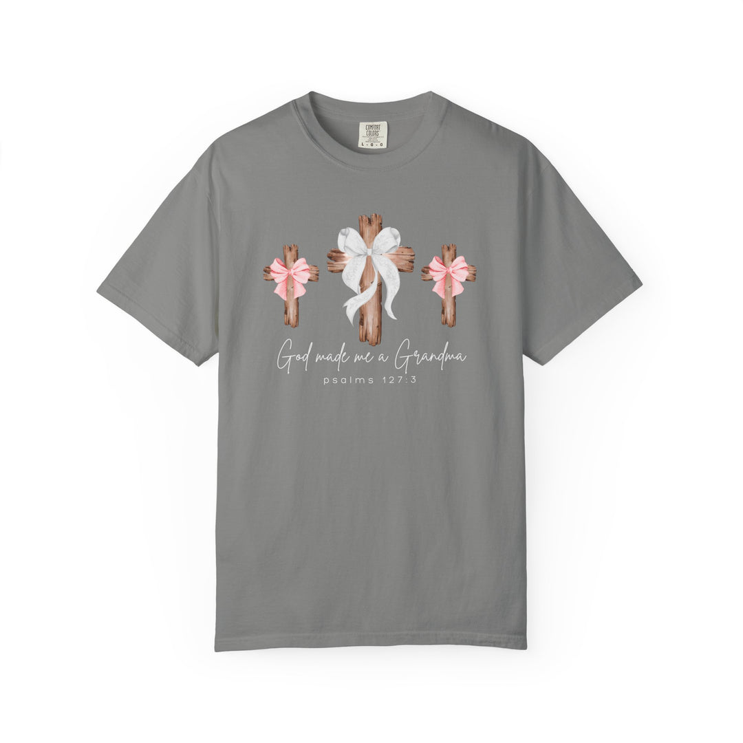 Heather-gray T-shirt featuring three rustic crosses with bows and the text God made me a Grandma psalms 127:3 in mixed fonts.