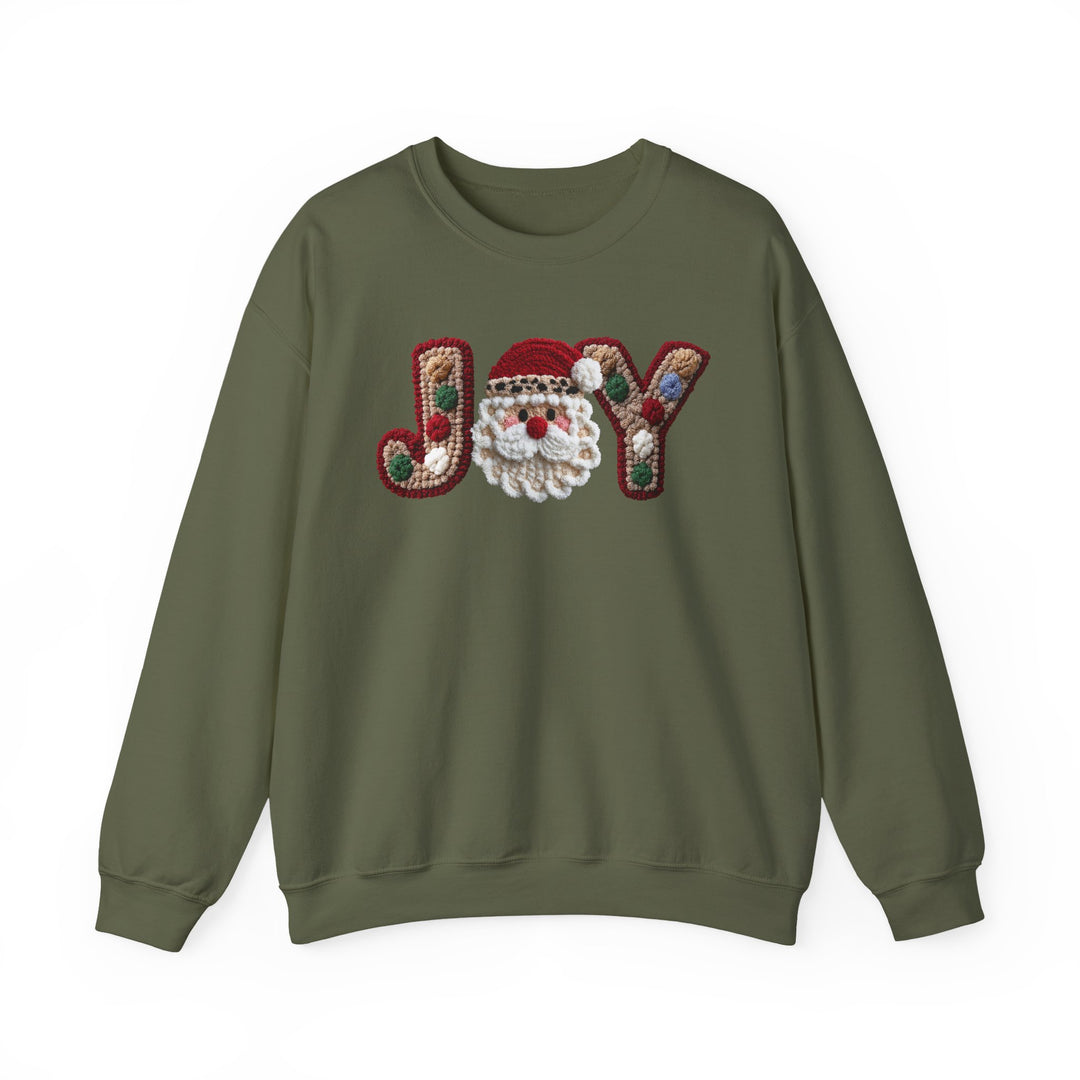 Forest-green Joy Crew sweatshirt featuring a gingerbread-themed JOY design with a Santa face. Cozy, durable, classic fit for festive comfort.