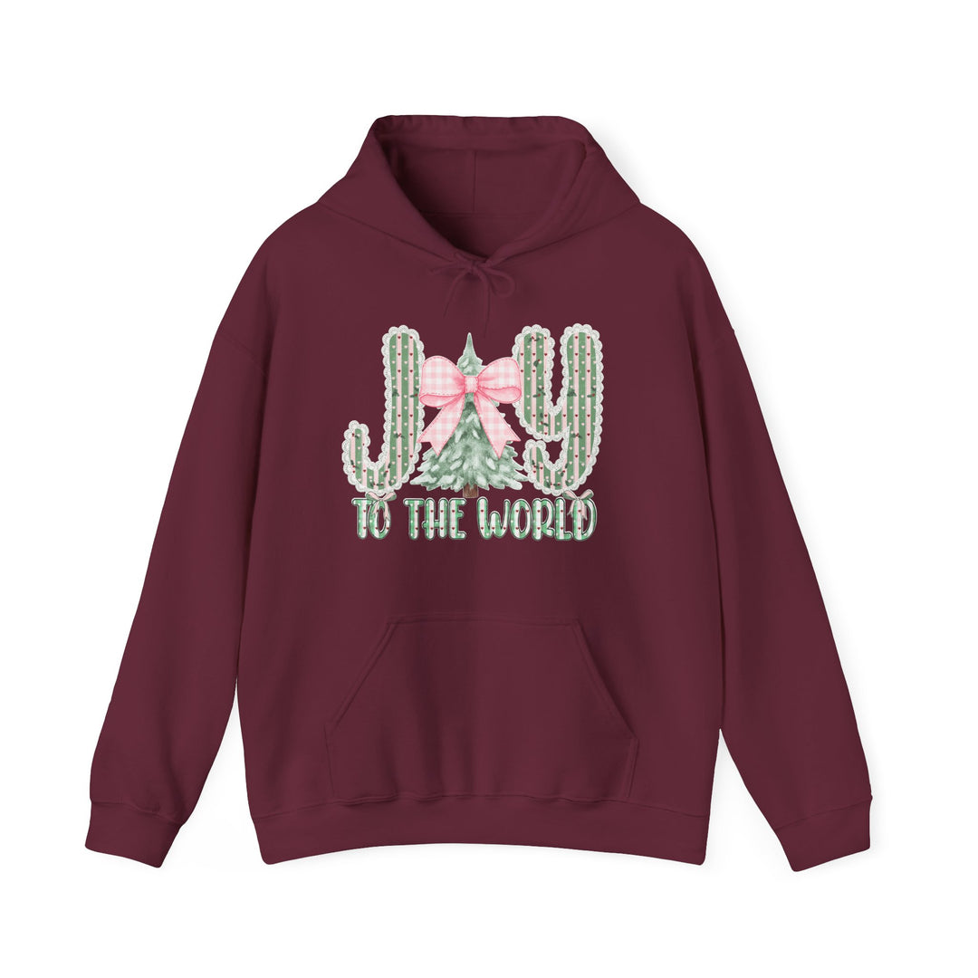 Joy to the World Hoodie featuring cacti and Christmas tree graphic, cozy cotton-poly blend, with kangaroo pocket and color-matched drawstring, perfect for chilly days.
