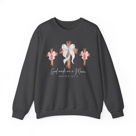 God Made Me a Mama Crew sweatshirt features three wooden crosses with bows and script text, blending comfort and style in a unisex, loose-fit design.