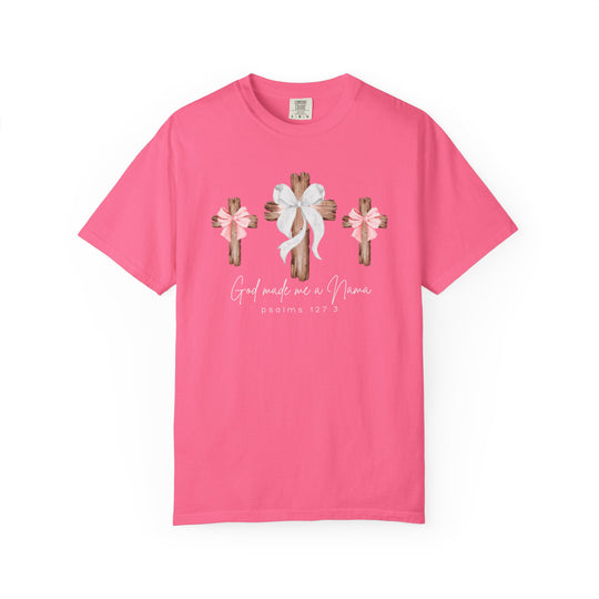 Bright pink 'God Made Me a Nana' tee featuring rustic crosses and bows, crafted from soft, durable, garment-dyed cotton by Comfort Colors.
