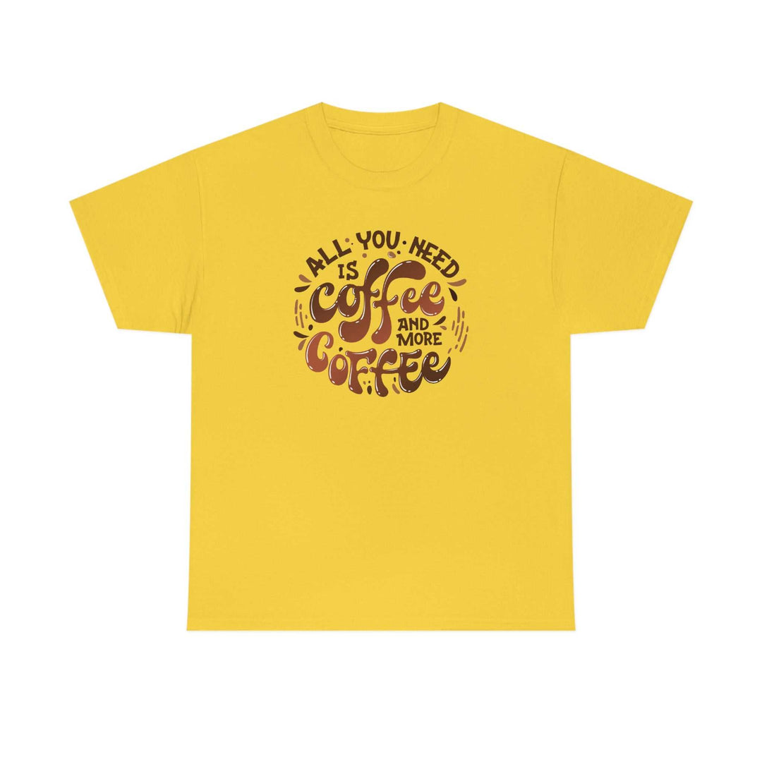 Unisex heavy cotton tee featuring All You Need is Coffee quote graphic. Classic fit with ribbed knit collar, no side seams, and durable tape on shoulders. Medium weight fabric in various sizes.