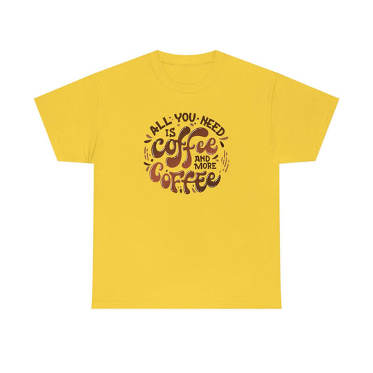 Unisex heavy cotton tee featuring All You Need is Coffee quote graphic. Classic fit with ribbed knit collar, no side seams, and durable tape on shoulders. Medium weight fabric in various sizes.