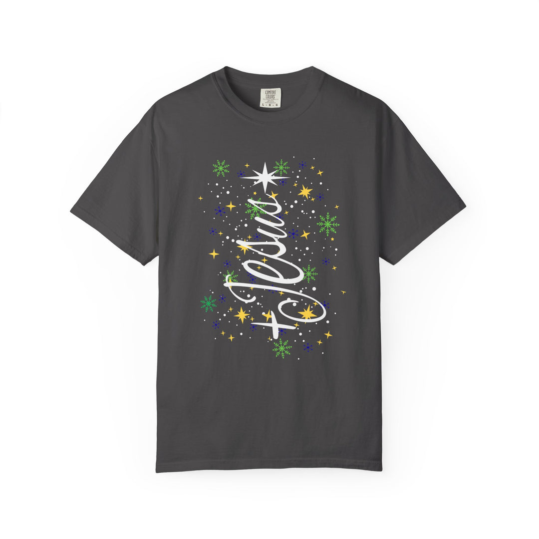 Charcoal-gray Jesus Tree Tee featuring festive stars and snowflakes around bold white script. Available in various sizes, offering luxurious comfort and style.