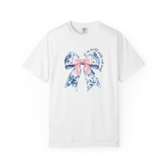 White T-shirt featuring a large decorative bow with a blue-and-white floral pattern and pink knot, encircled by the phrase “It is well with my soul”.