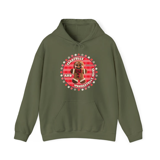 Olive-green pullover hoodie with kangaroo pocket, featuring a gingerbread man graphic and Fearfully and Wonderfully Made slogan, embodying cozy style from Faith Family Designs.
