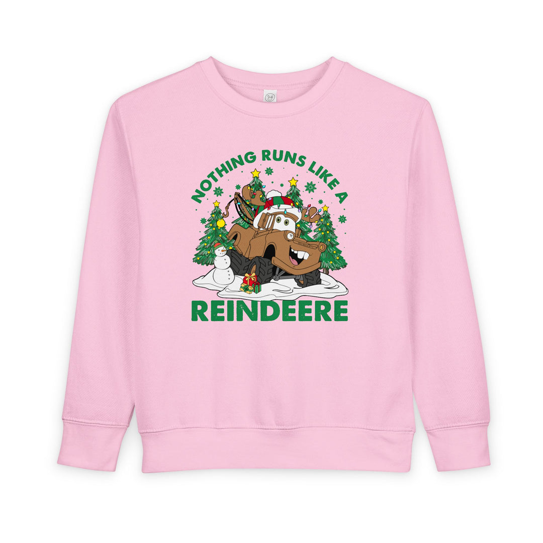 Pink Reindeere Toddler Crew sweatshirt featuring a Christmas-themed cartoon of a reindeer tow-truck with snowman, gifts, and snowflakes; cozy cotton-polyester blend.