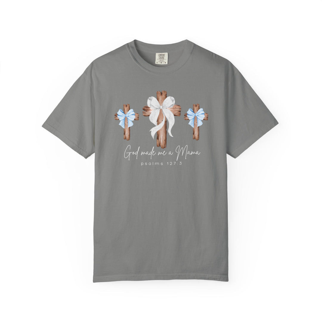 Heather-gray T-shirt with three wooden crosses, the central one larger with a white bow. Text reads “God made me a Mama,” “psalms 127:3.”