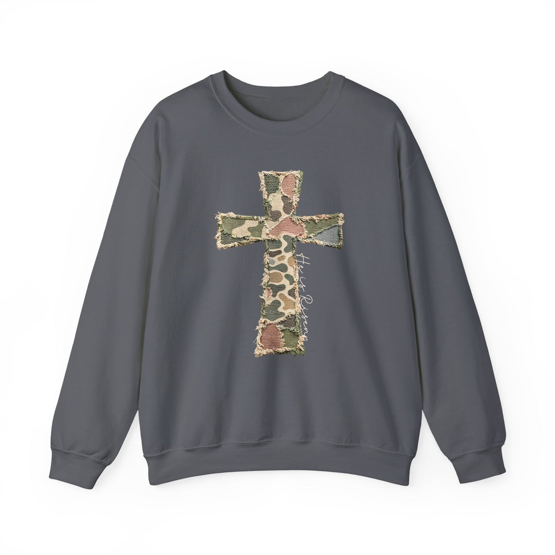 Heis Risen Cross Crew sweatshirt features a frayed camo cross with 'He is Risen' text, offering comfort and style from Faith Family Designs.