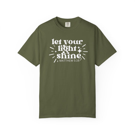 Let Your Light Shine Tee: Olive-green crew-neck T-shirt with “let your light shine” and “MATTHEW 5:16” in white, featuring star accents. Comfortable, durable, relaxed fit.