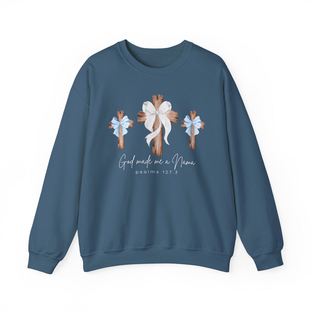 Blue sweatshirt with three wooden crosses and 'God made me a Nana' text, offering comfort with a polyester-cotton blend and ribbed collar.