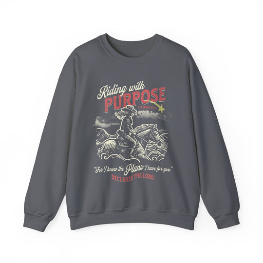 Riding for a Purpose Crew: Grey sweatshirt featuring a graphic of a cowboy on horseback, crafted from a cotton-poly blend for comfort and style.