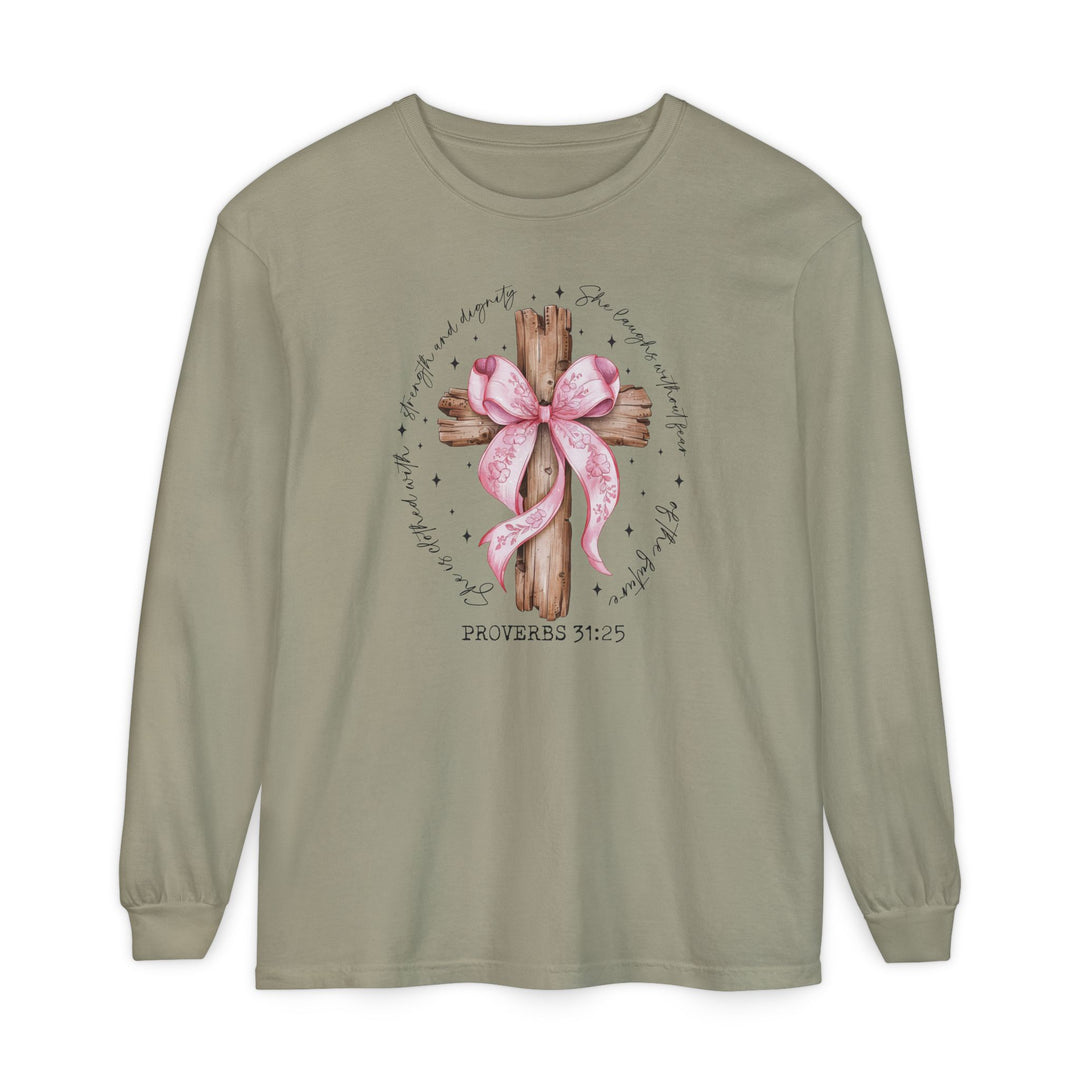 Proverbs 31:25 Long Sleeve Tee with a wooden cross and pink ribbon design encircled by scripture, showcasing strength and dignity on soft, garment-dyed cotton.
