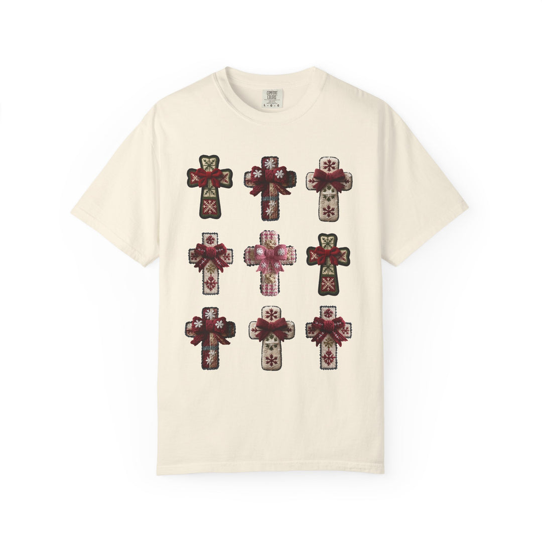 Crosses Tee featuring a 3x3 grid of decorative, holiday-style crosses with red bows on a light-cream T-shirt, embodying stylish comfort from Faith Family Designs.