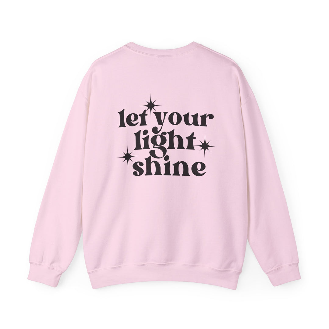 A unisex heavy blend crewneck sweatshirt, Let Your Light Shine Crew, offers pure comfort with ribbed knit collar, no itchy seams, and a loose fit. Made of 50% cotton and 50% polyester. Medium-heavy fabric.